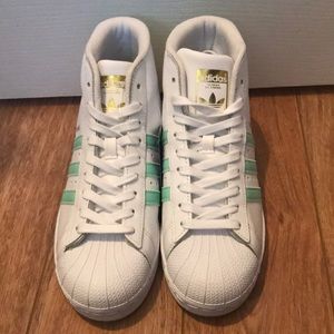 White and teal BOYS hard shell Adidas